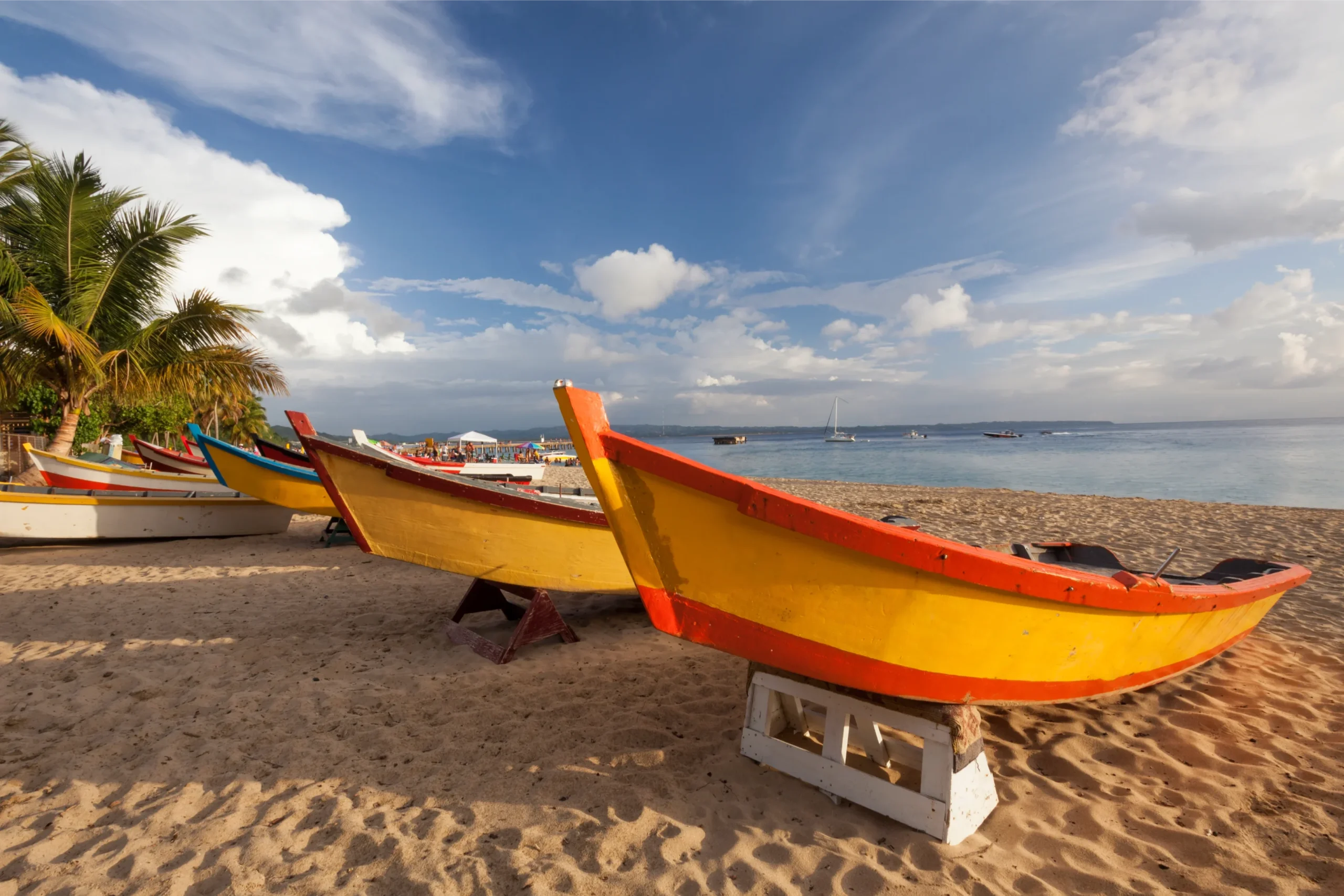 colorful-fishing-boats-on-a-caribbean-sandy-beach-2026-03-19-22-25-39-utc